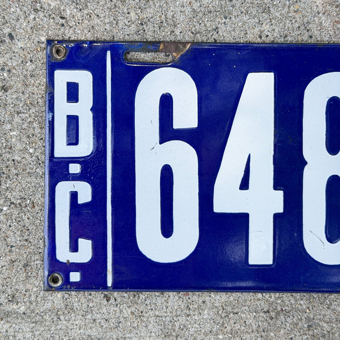 Photo of a 1913 British Columbia Porcelain License Plate Auto Tag Garage Decor Vintage High Quality 6481 with original patina
