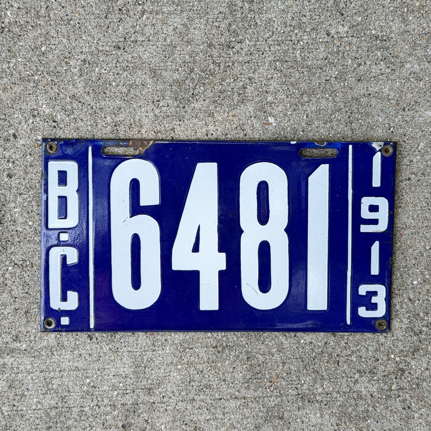Photo of a 1913 British Columbia Porcelain License Plate Auto Tag Garage Decor Vintage High Quality 6481 with original patina