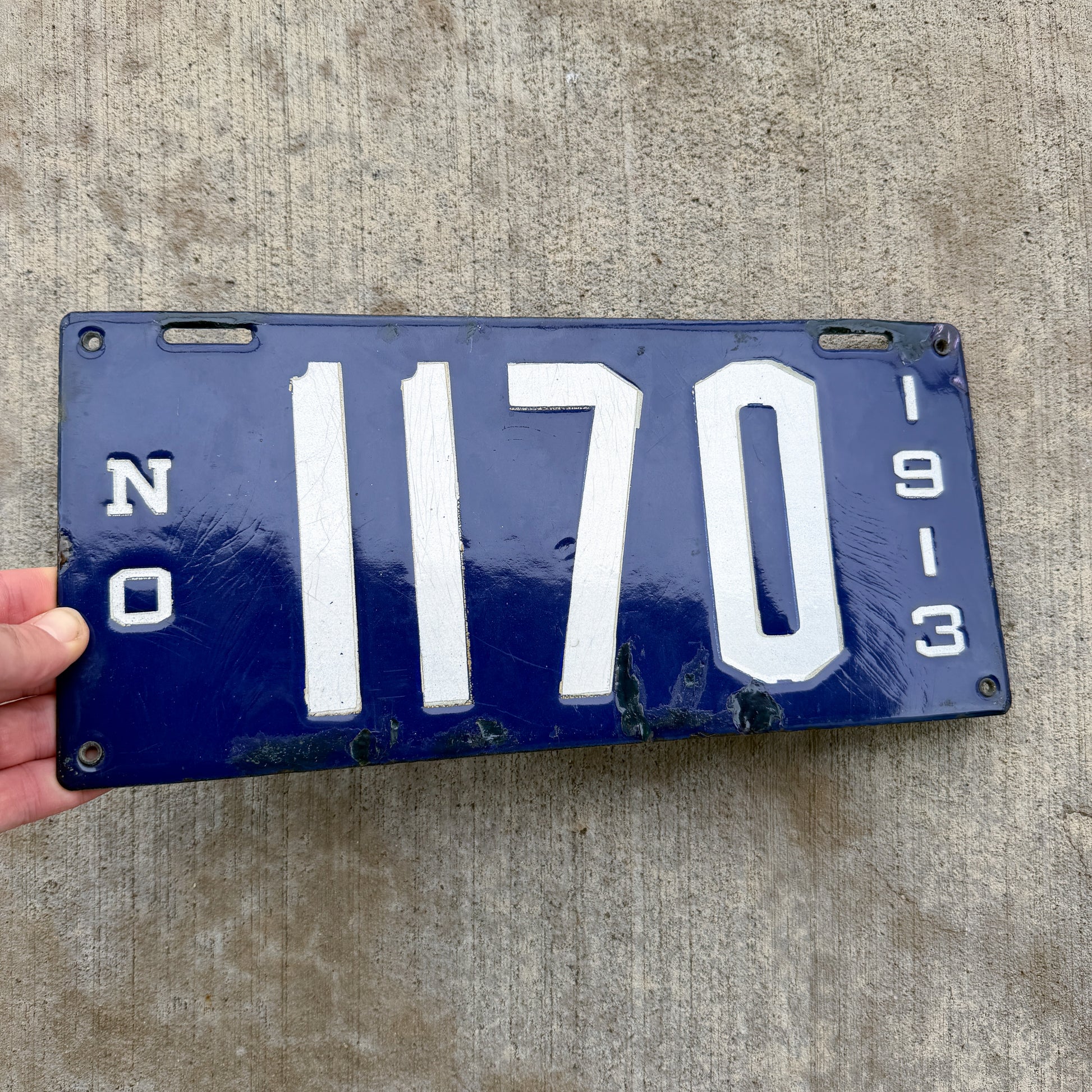 Photo of a 1913 Louisiana Porcelain License Plate Auto Tag Garage Decor Vintage High Quality 1170 with original patina