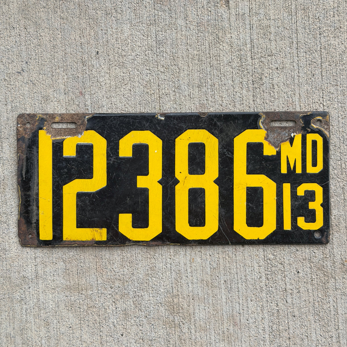 Photo of a 1913 Maryland Porcelain License Plate Auto Tag Garage Decor Vintage 12386 with original patina
