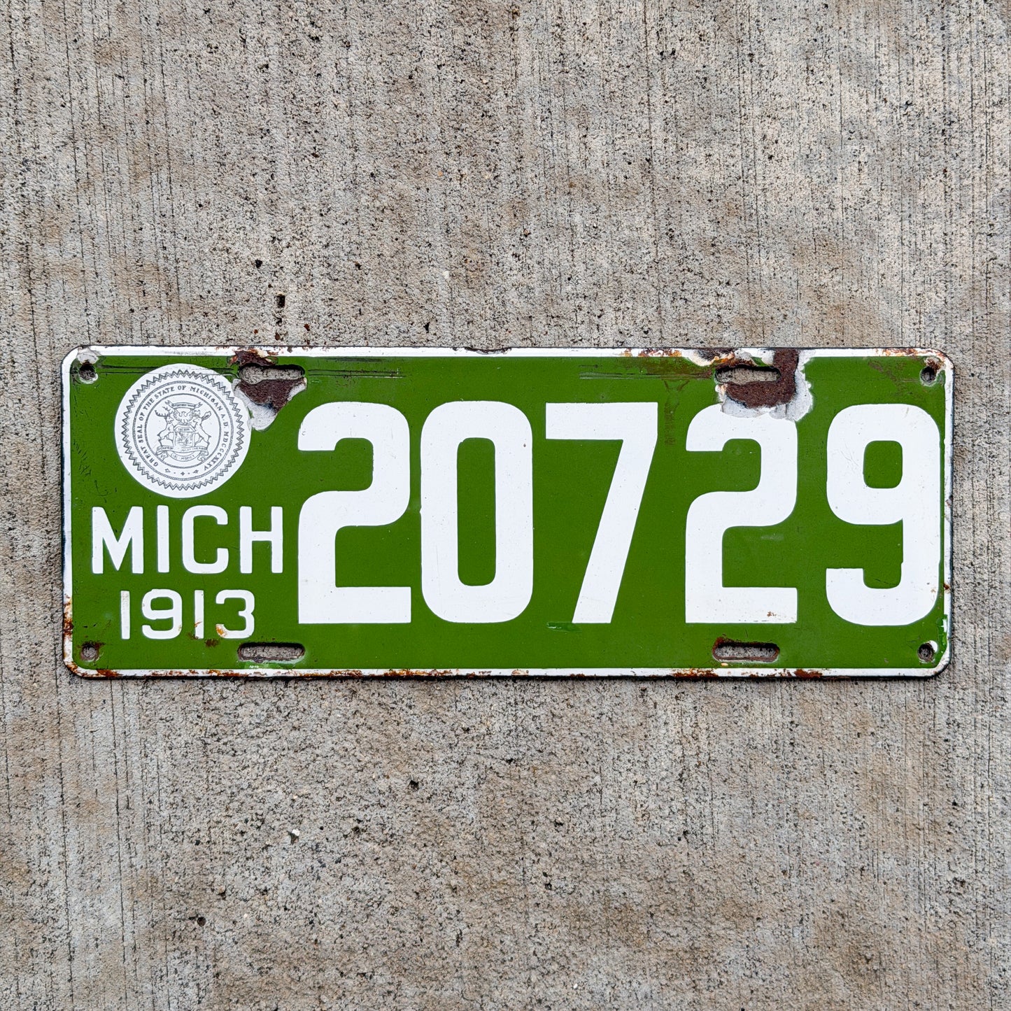 Photo of a 1913 Michigan Porcelain License Plate Auto Tag Garage Decor Vintage 20729 with original patina