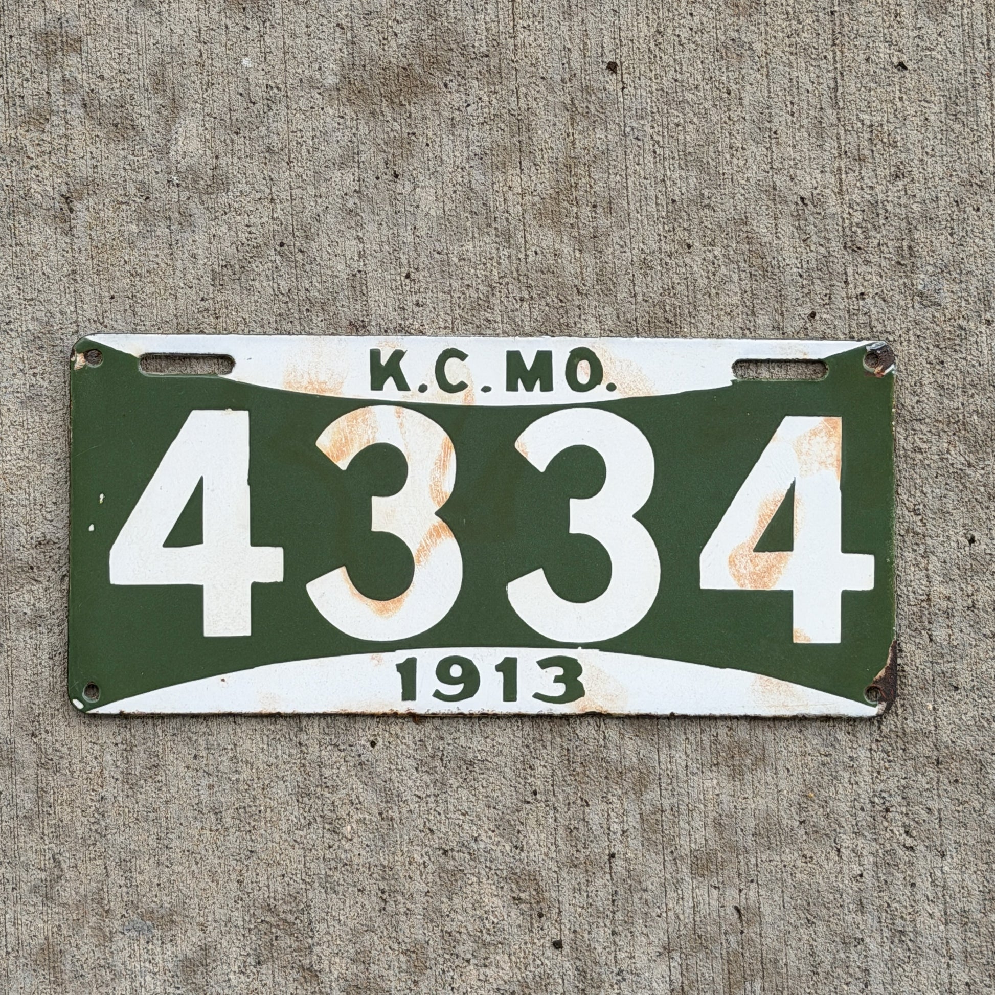 Photo of a 1913 Missouri Porcelain City License Plate Auto Tag Garage Decor Vintage Kansas City 4334 with original patina