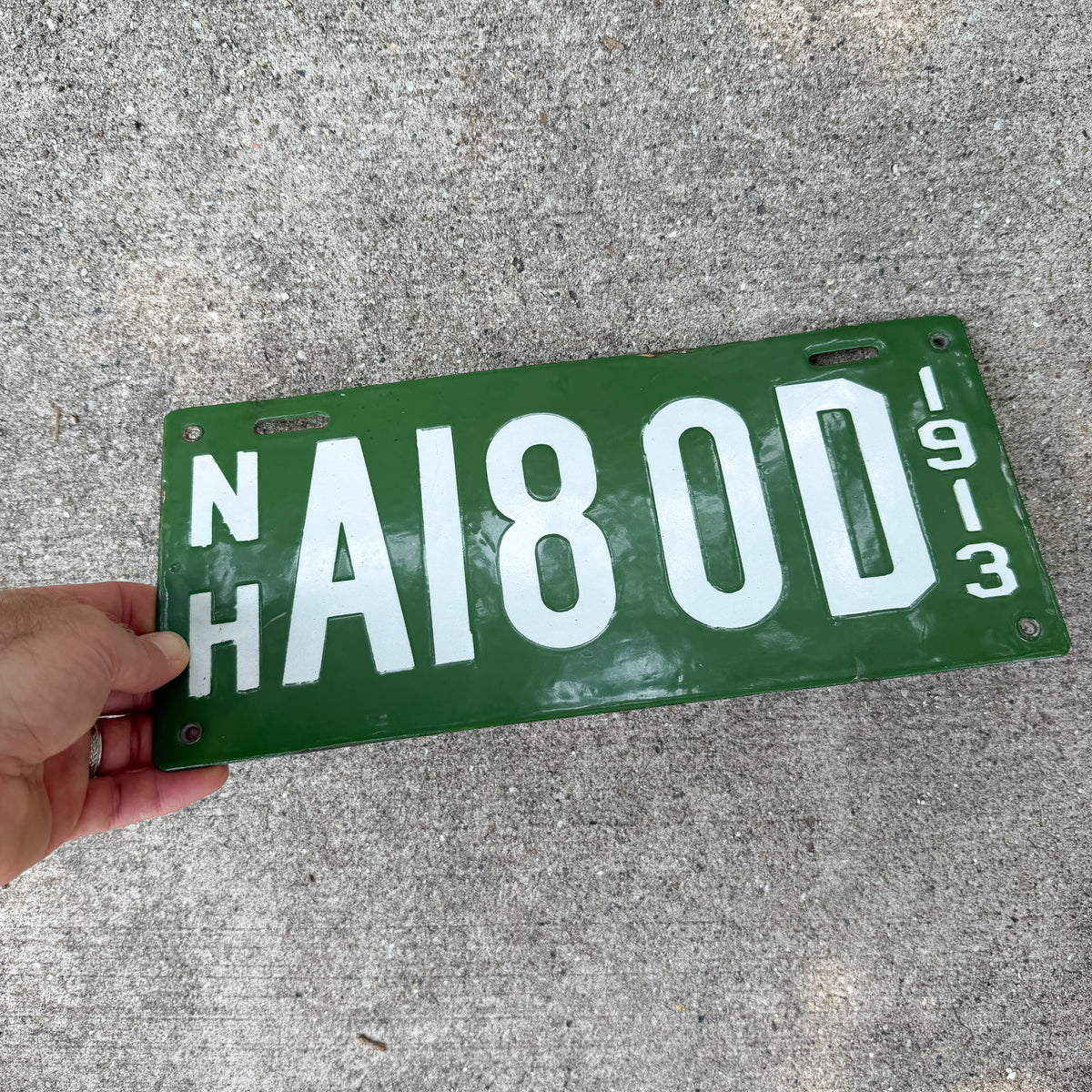 Photo of a 1913 New Hampshire Porcelain Dealer License Plate Auto Tag Garage Decor Vintage High Quality A 180 D with original patina