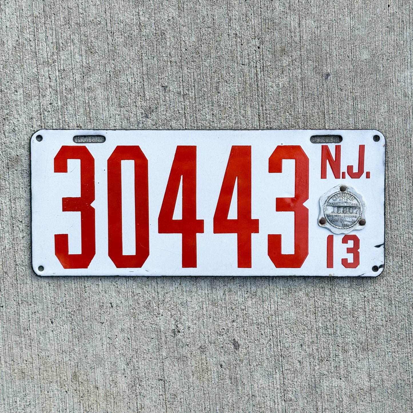 Photo of a 1913 New Jersey Porcelain License Plate Auto Tag Garage Decor Vintage High Quality 30443 with original patina