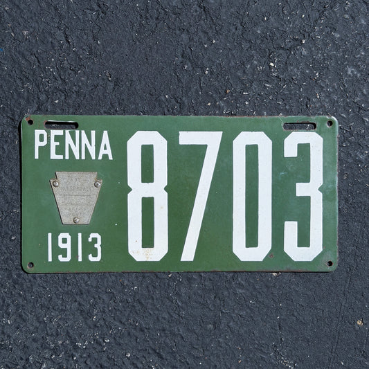 Photo of a 1913 Pennsylvania Porcelain License Plate Auto Tag Garage Decor Vintage High Quality Low Number Four Digit 8703 with original patina