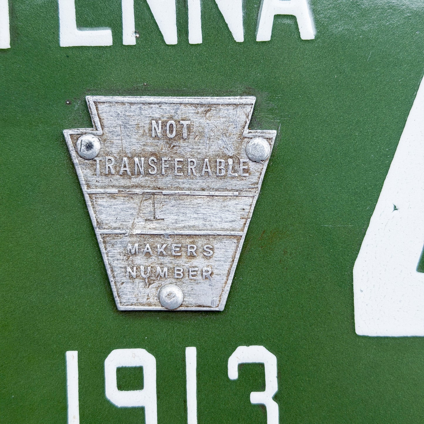 Photo of a 1913 Pennsylvania Porcelain License Plate Auto Tag Garage Decor Vintage High Quality Number 1 Tab 48327 with original patina