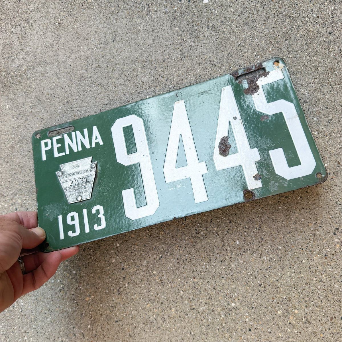 Photo of a 1913 Pennsylvania Porcelain License Plate Auto Tag Garage Decor Vintage Low Number Four Digit 9445 with original patina