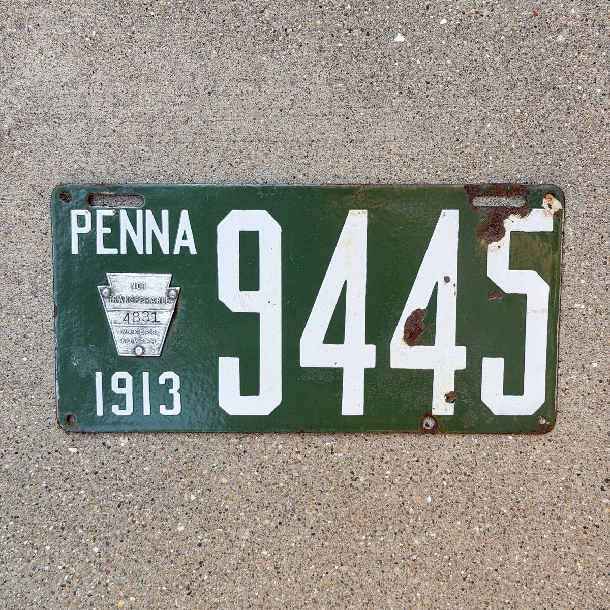 Photo of a 1913 Pennsylvania Porcelain License Plate Auto Tag Garage Decor Vintage Low Number Four Digit 9445 with original patina