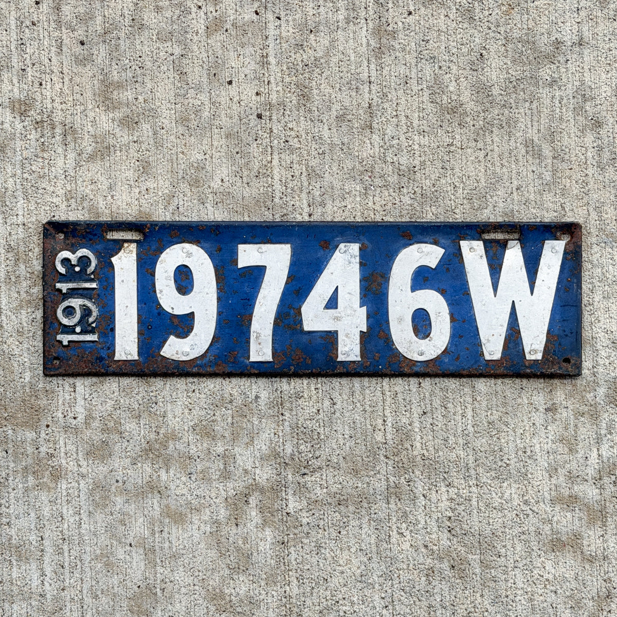 Photo of a 1913 Wisconsin License Plate Auto Tag Garage Decor Vintage 19746 with original patina
