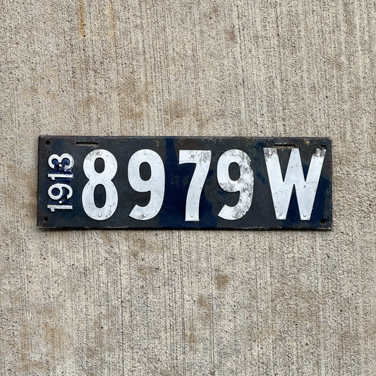 Photo of a 1913 Wisconsin License Plate Auto Tag Garage Decor Vintage Low Number Four Digit 8979 W with original patina