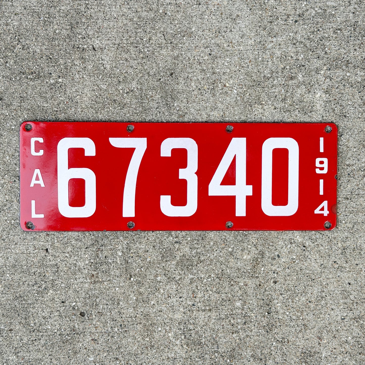Photo of a 1914 California Porcelain License Plate Auto Tag Garage Decor Vintage First Issue 67340 with original patina