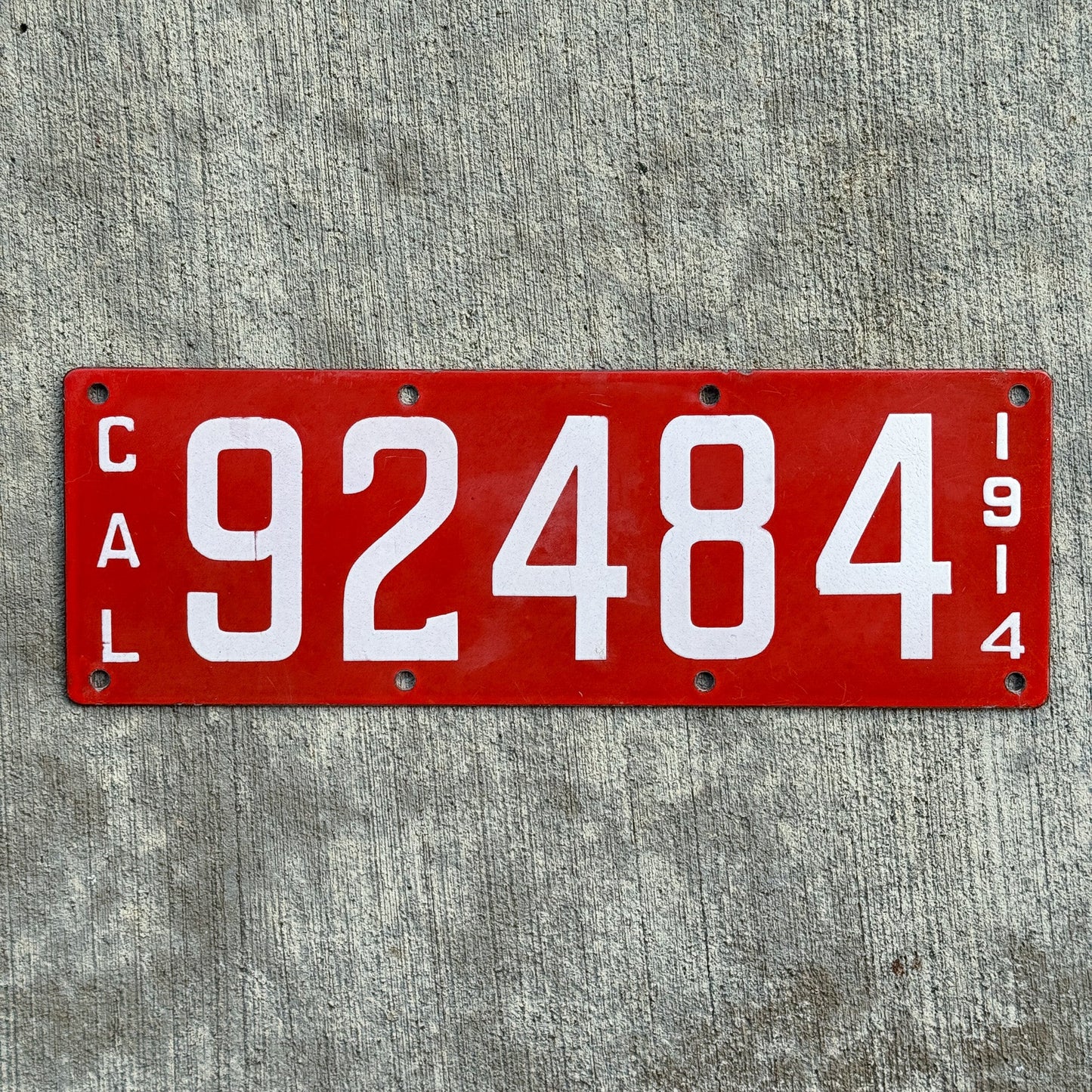 Photo of a 1914 California Porcelain License Plate Auto Tag Garage Decor Vintage First Issue High Quality 92484 with original patina