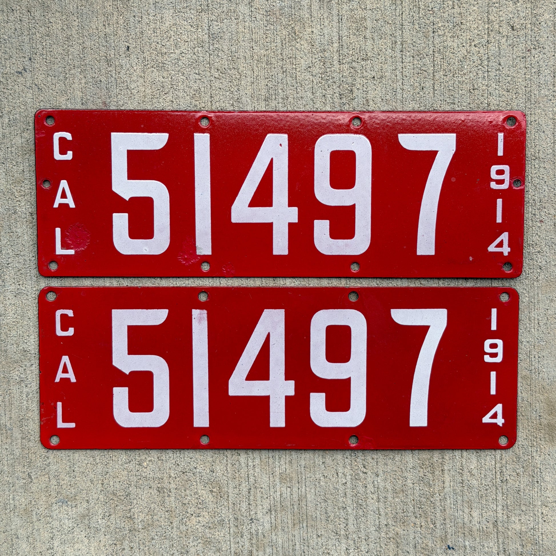 Photo of a 1914 California Porcelain License Plate Pair Auto Tag Garage Decor Vintage First Issue 51497 with original patina