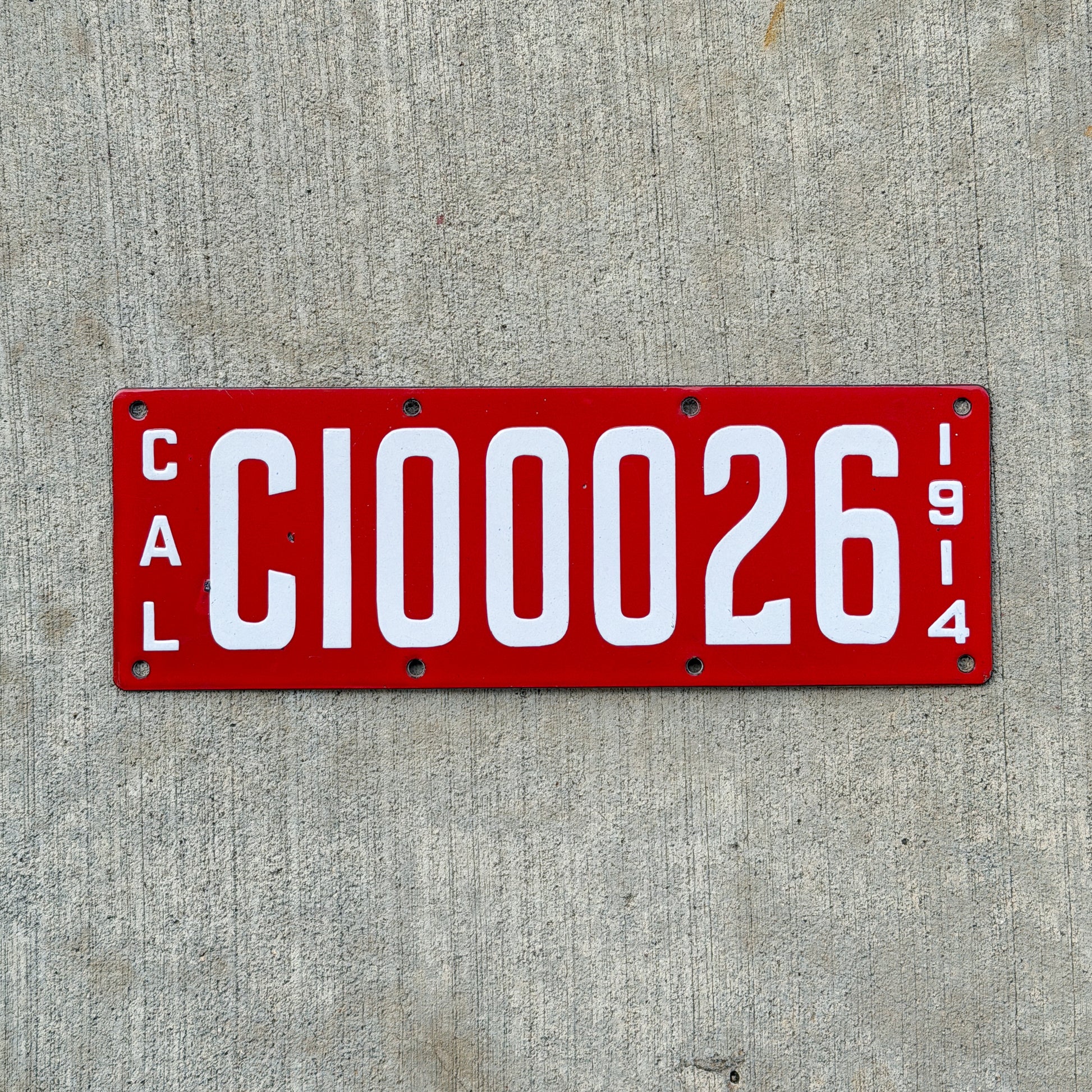 Photo of a 1914 California Porcelain Used Car Dealer License Plate Auto Tag Garage Decor Vintage High Quality C 100026 with original patina