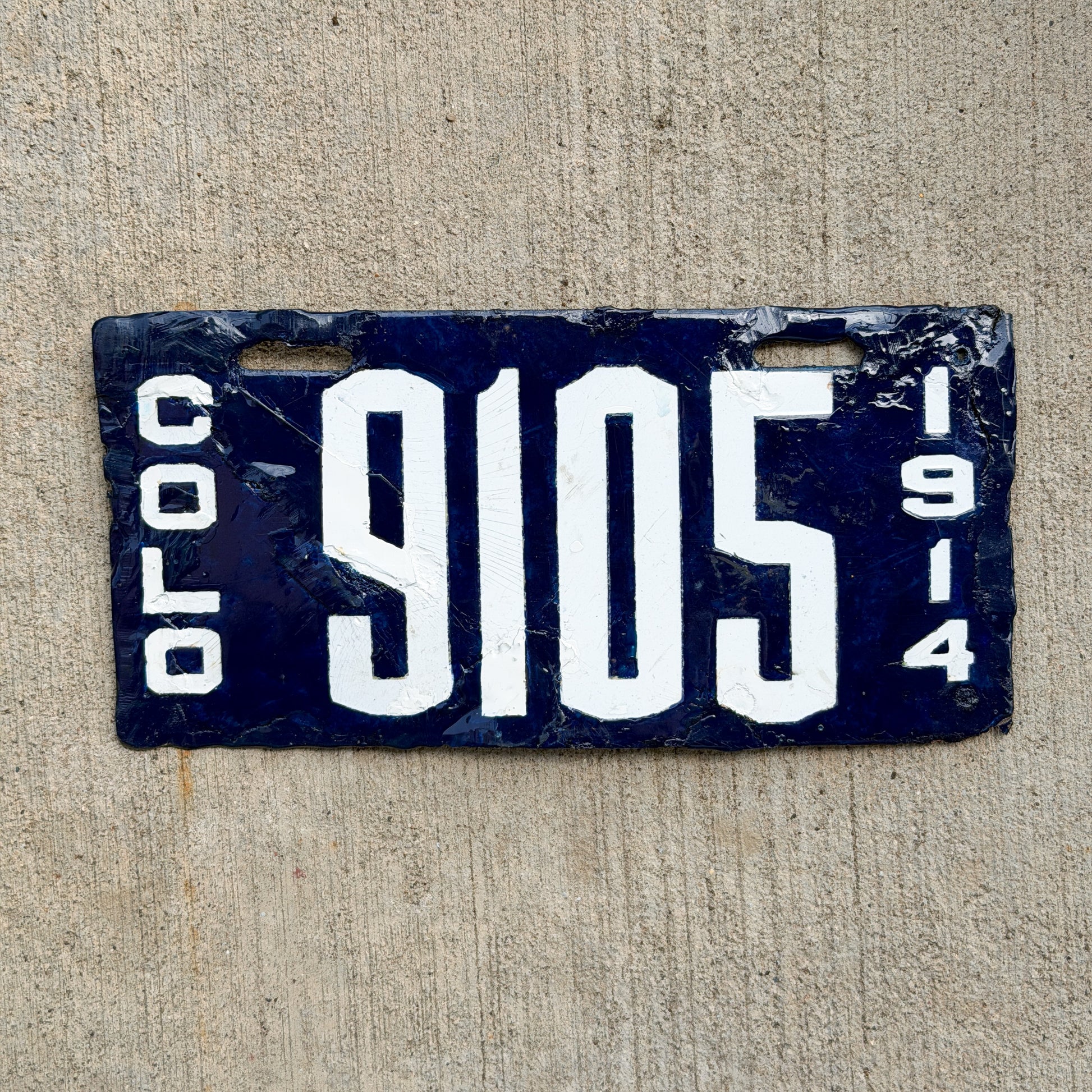 Photo of a 1914 Colorado Porcelain License Plate Auto Tag Garage Decor Vintage Low Number Four Digit 9105 with original patina