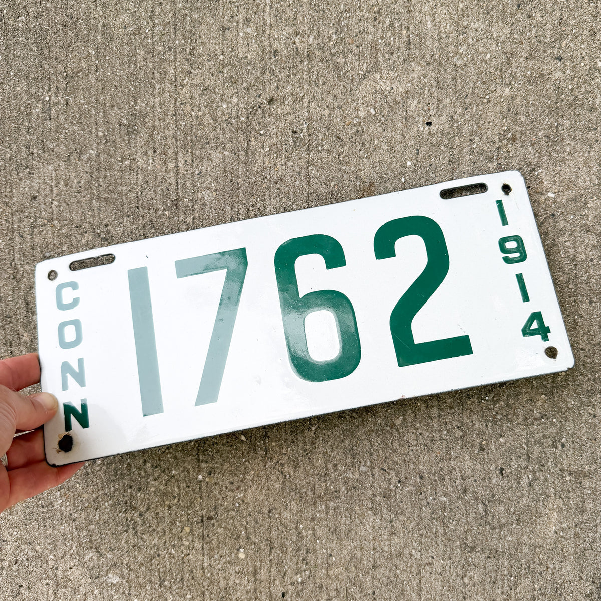 Photo of a 1914 Connecticut Porcelain Commercial License Plate Auto Tag Garage Decor Vintage High Quality Four Digit 1762 with original patina