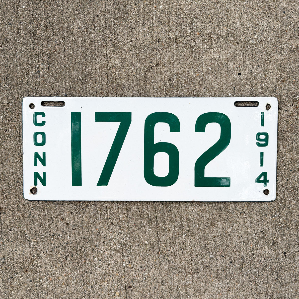Photo of a 1914 Connecticut Porcelain Commercial License Plate Auto Tag Garage Decor Vintage High Quality Four Digit 1762 with original patina