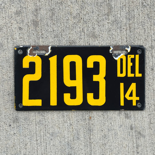 Photo of a 1914 Delaware Porcelain License Plate Auto Tag Garage Decor Vintage Low Number Four Digit 2193 with original patina