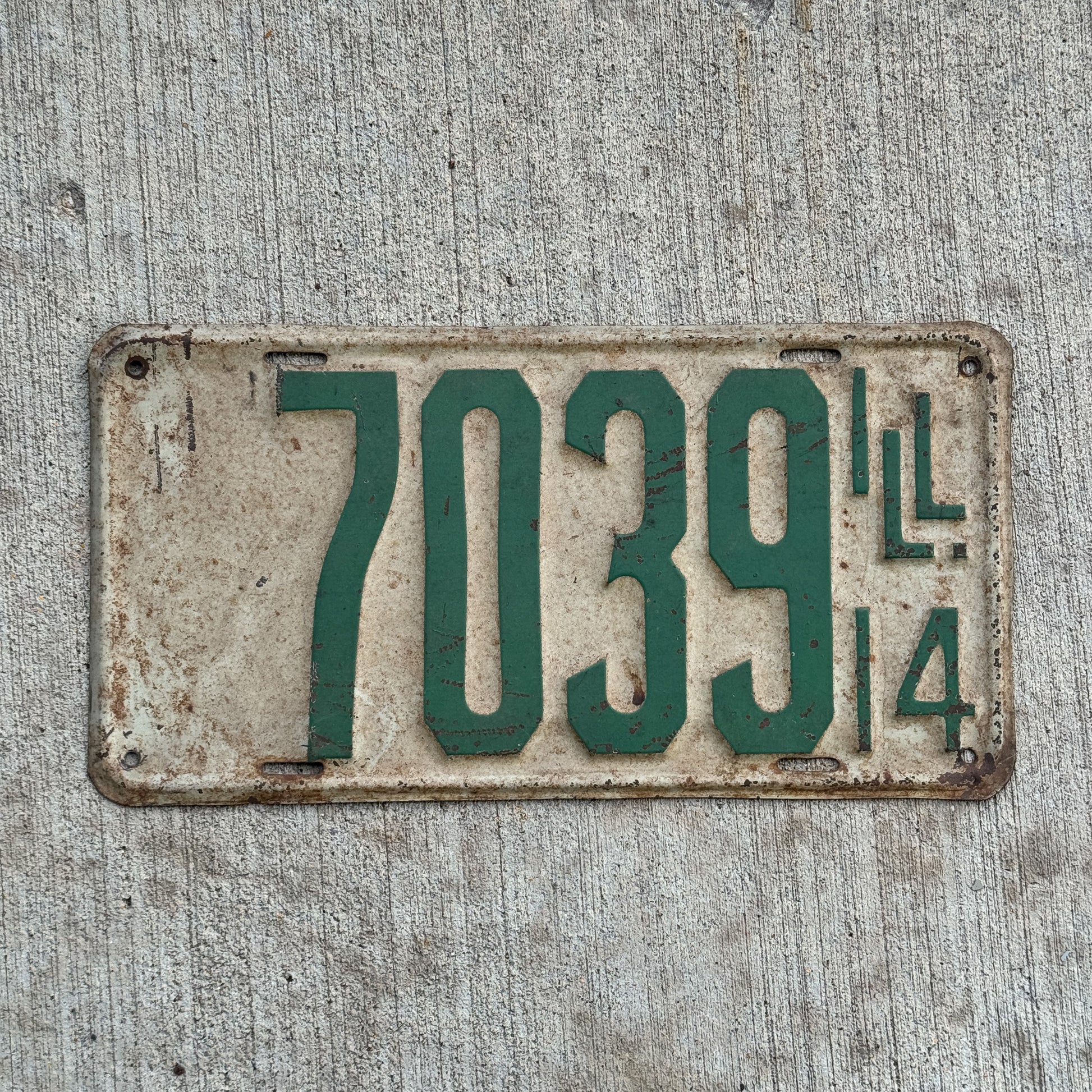 Photo of a 1914 Illinois License Plate Auto Tag Garage Decor Vintage 7039 with original patina