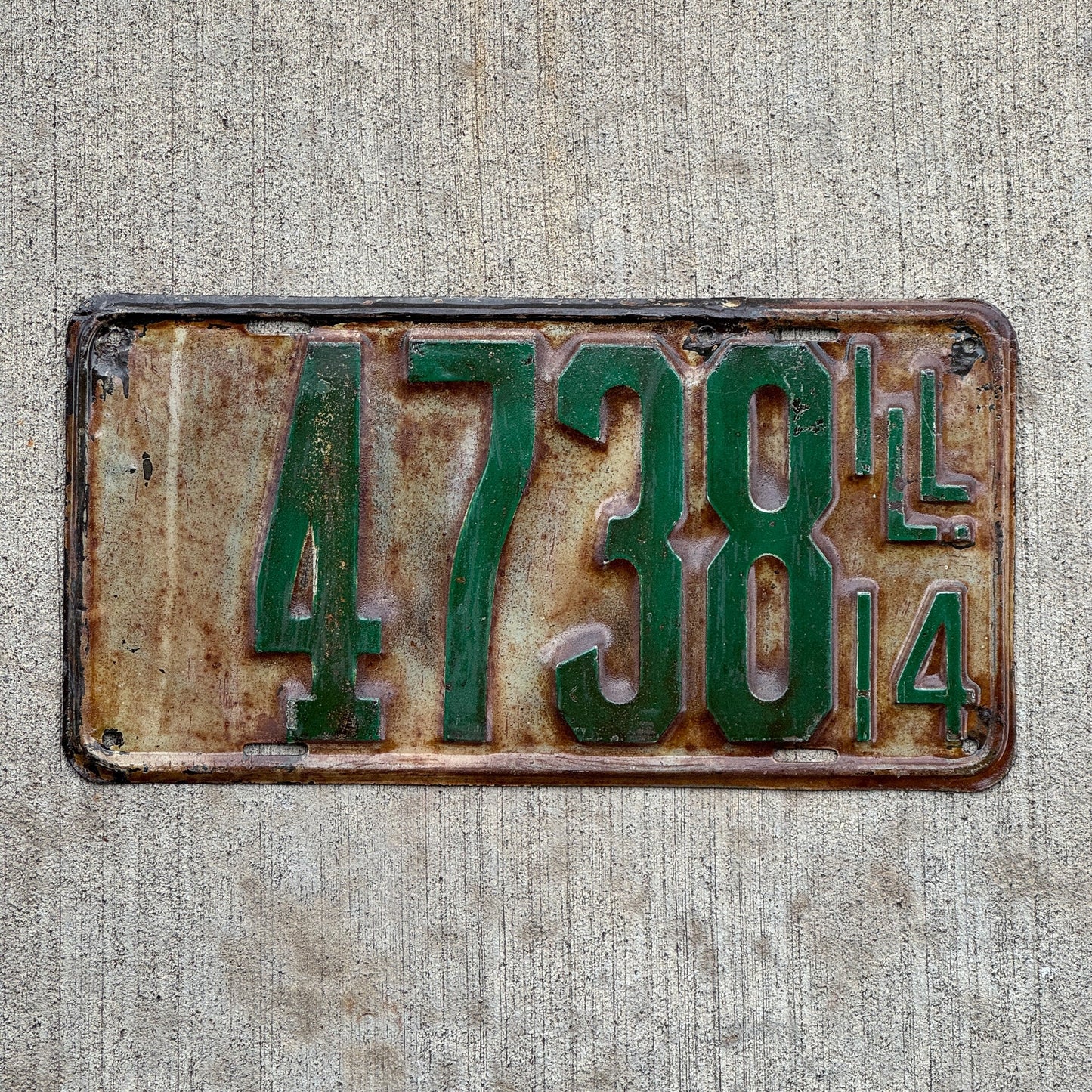 Photo of a 1914 Illinois License Plate Auto Tag Garage Decor Vintage Low Number Four Digit 4738 with original patina