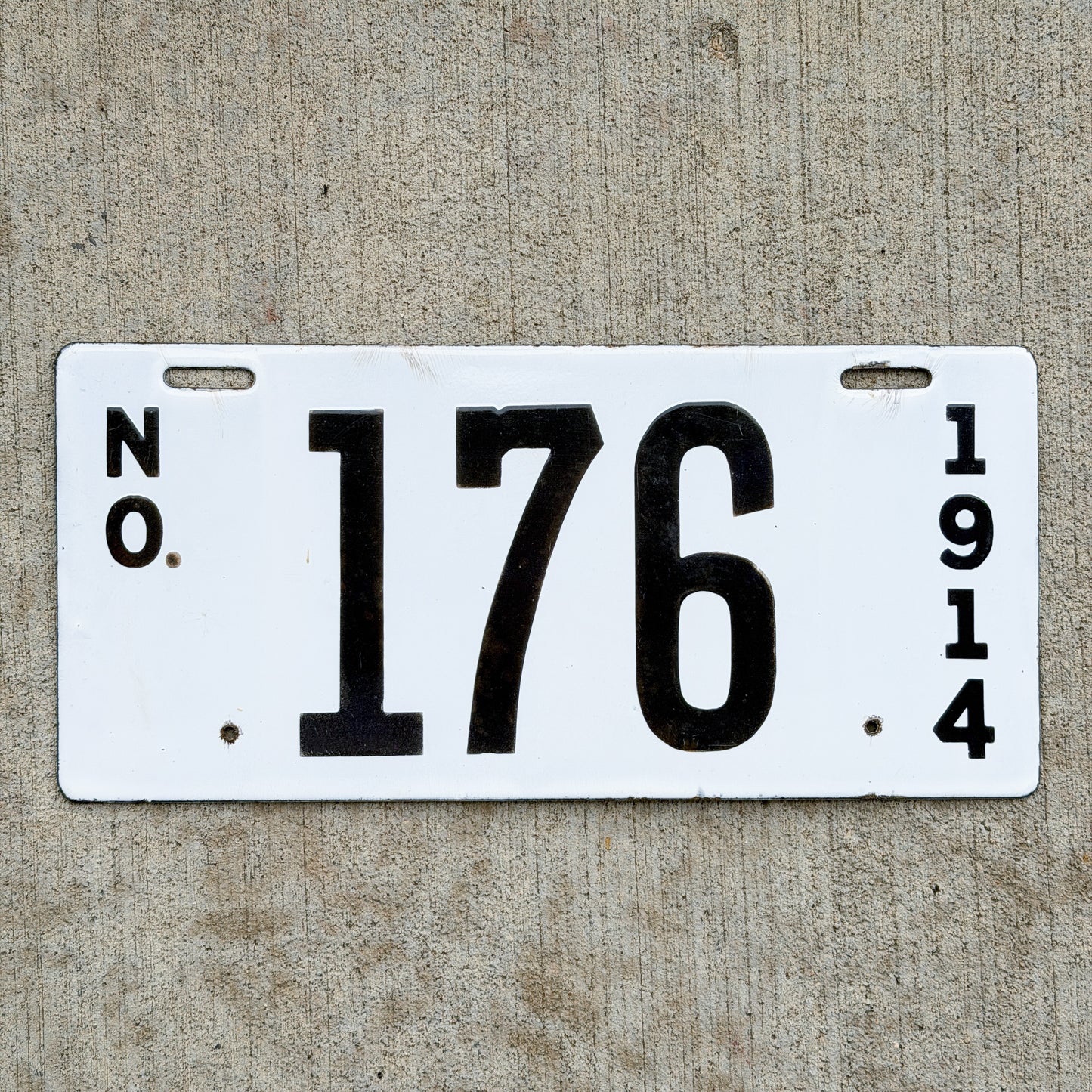 Photo of a 1914 Louisiana Porcelain License Plate Auto Tag Garage Decor Vintage High Quality 176 with original patina