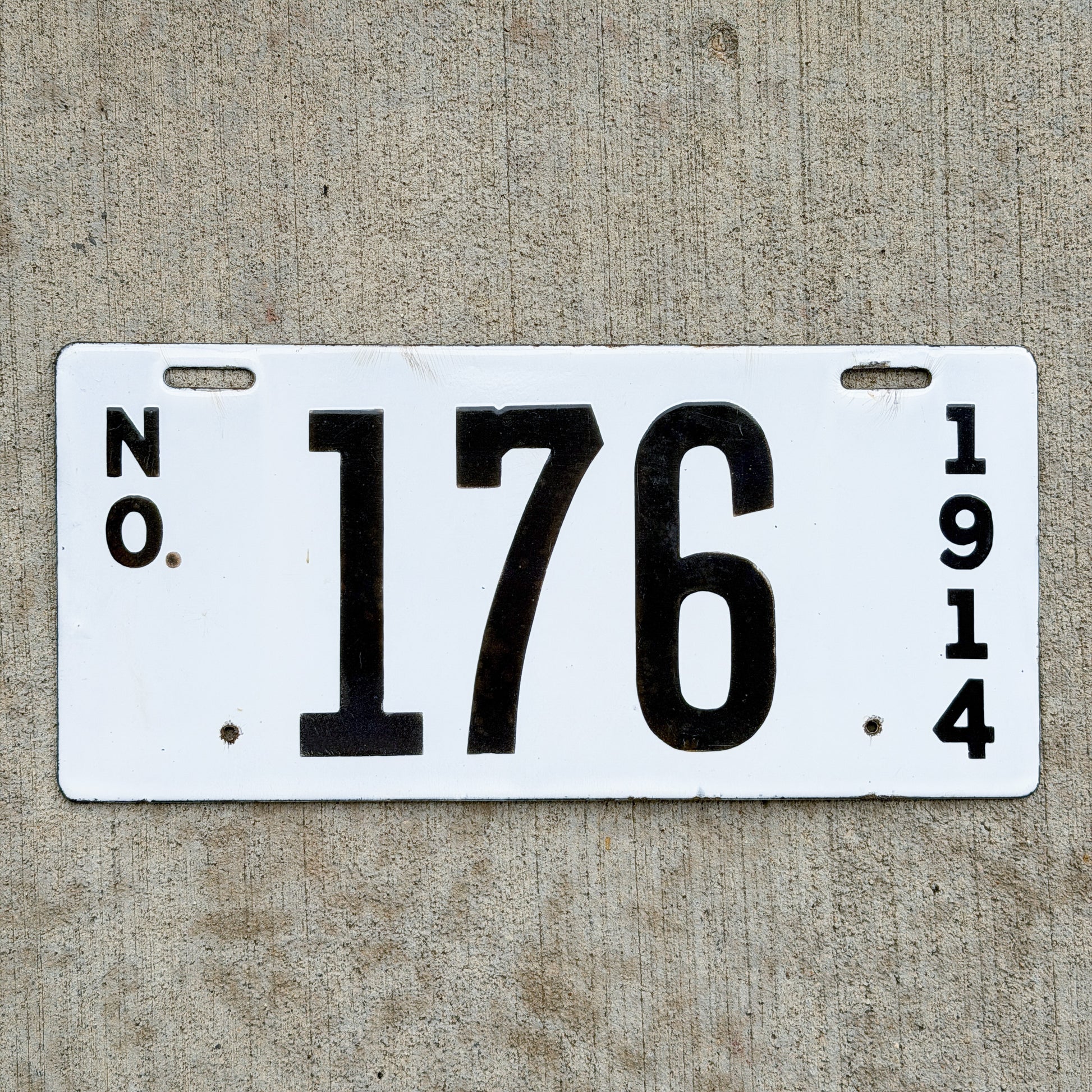 Photo of a 1914 Louisiana Porcelain License Plate Auto Tag Garage Decor Vintage High Quality 176 with original patina
