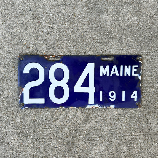 Photo of a 1914 Maine Porcelain License Plate Auto Tag Garage Decor Vintage Low Number Three Digit 284 with original patina