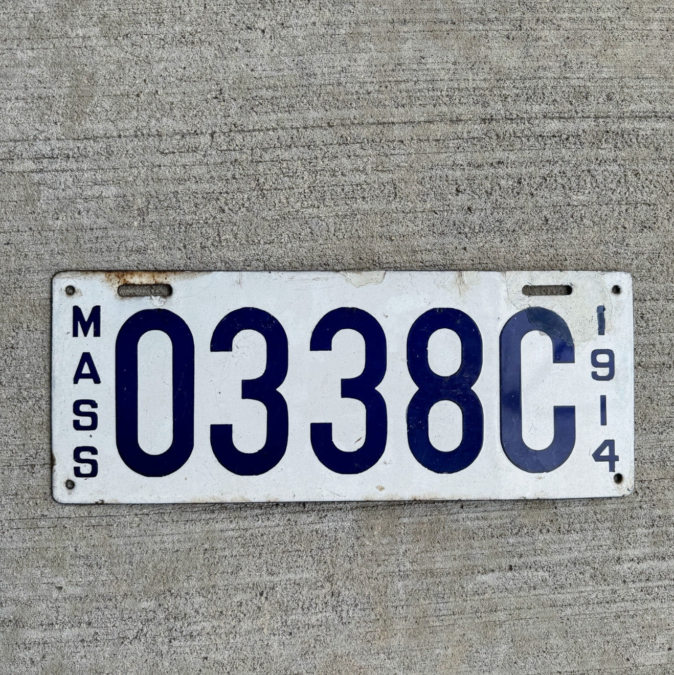 Photo of a 1914 Massachusetts Porcelain Dealer License Plate Auto Tag Garage Decor Vintage 0 338 C with original patina