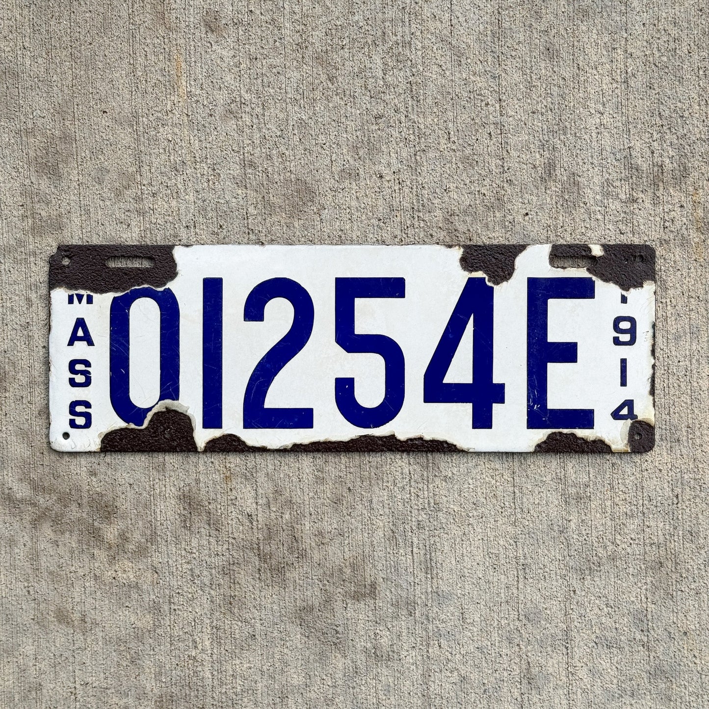 Photo of a 1914 Massachusetts Porcelain Dealer License Plate Auto Tag Garage Decor Vintage 01254 E with original patina
