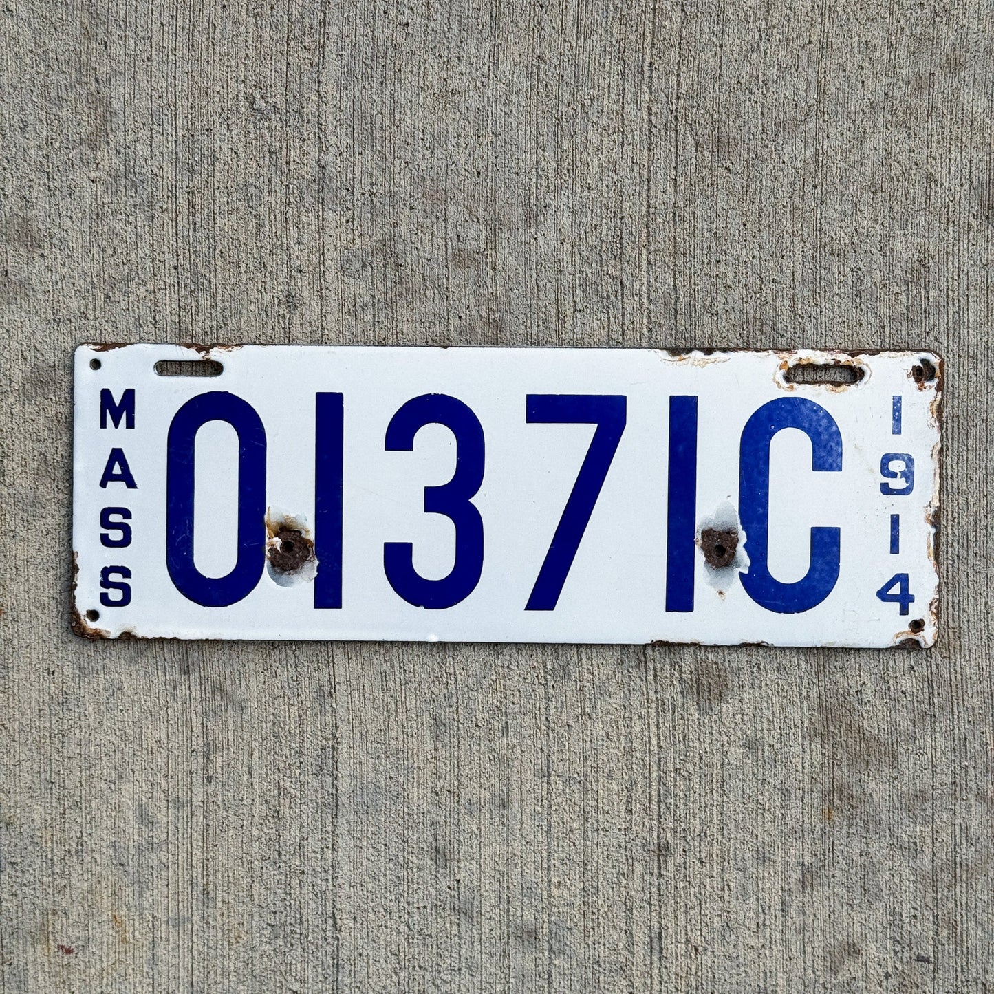 Photo of a 1914 Massachusetts Porcelain Dealer License Plate Auto Tag Garage Decor Vintage 01371 C with original patina