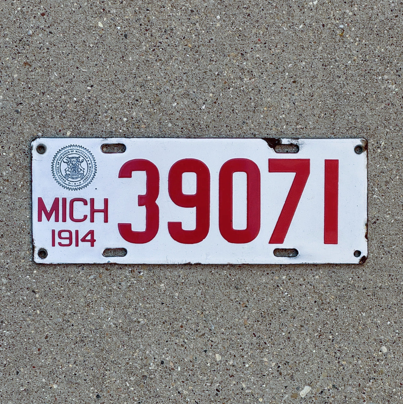 Photo of a 1914 Michigan Porcelain License Plate Auto Tag Garage Decor Vintage 39071 with original patina