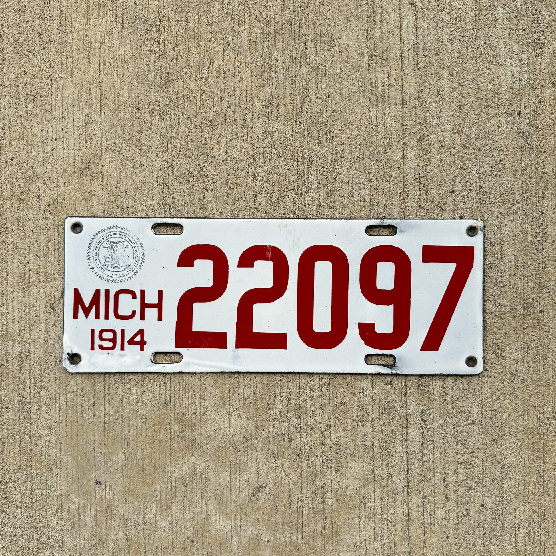 Photo of a 1914 Michigan Porcelain License Plate Auto Tag Garage Decor Vintage High Quality 22097 with original patina