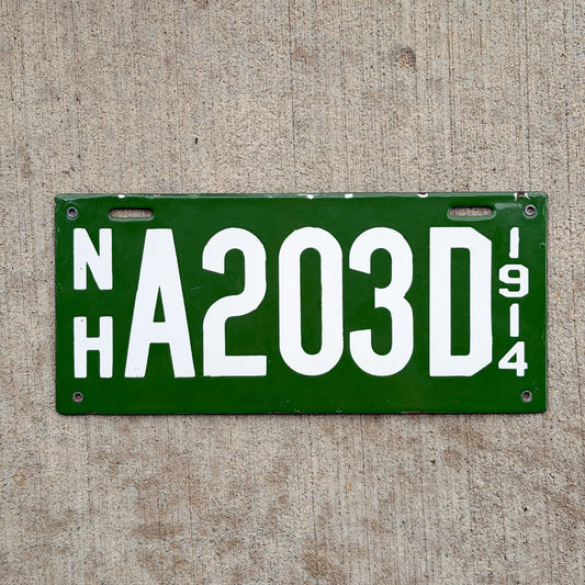 Photo of a 1914 New Hampshire Porcelain Dealer License Plate Auto Tag Garage Decor Vintage High Quality A 203 D with original patina