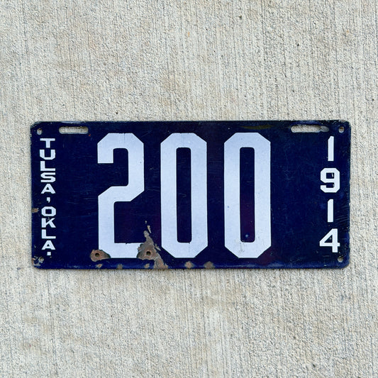 Photo of a 1914 Oklahoma Porcelain License Plate Auto Tag Garage Decor Vintage High Quality 200 with original patina