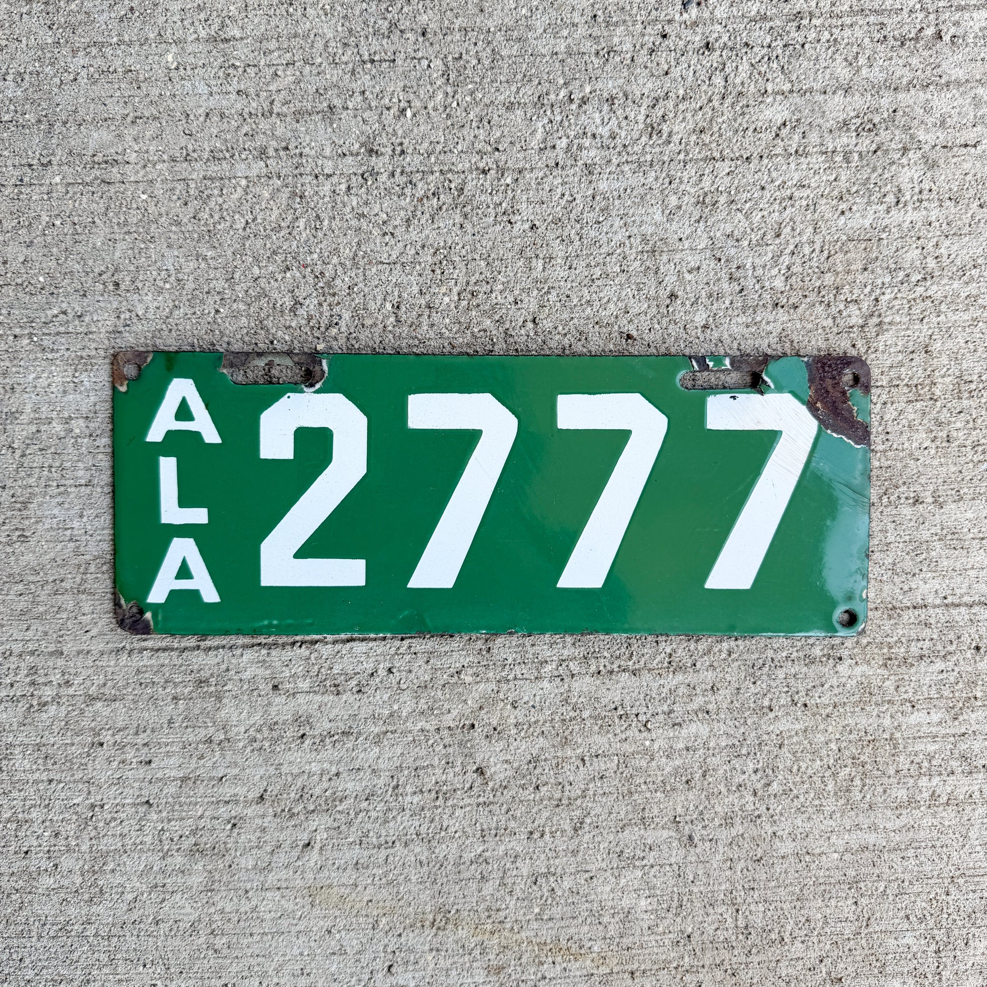 Photo of a 1915 Alabama Porcelain License Plate Auto Tag Garage Decor Vintage Repeat Repeating 2777 with original patina