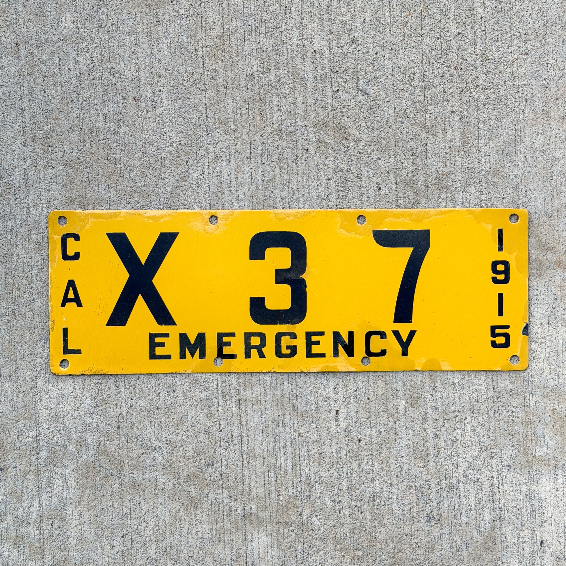 Photo of a 1915 California Porcelain Emergency License Plate Auto Tag Garage Decor Vintage X 37 with original patina