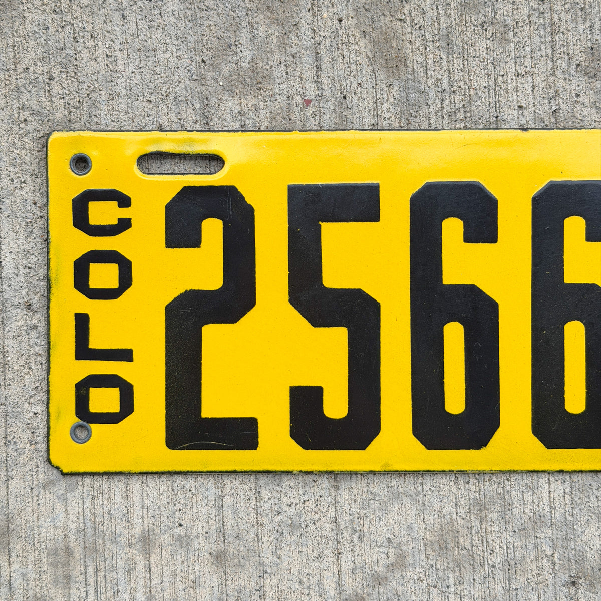 Photo of a 1915 Colorado Porcelain License Plate Auto Tag Garage Decor Vintage High Quality 25665 with original patina