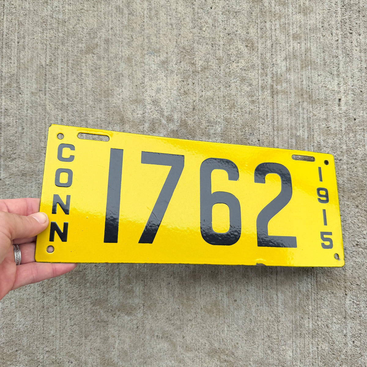 Photo of a 1915 Connecticut Porcelain Commercial License Plate Auto Tag Garage Decor Vintage High Quality Four Digit 1762 with original patina