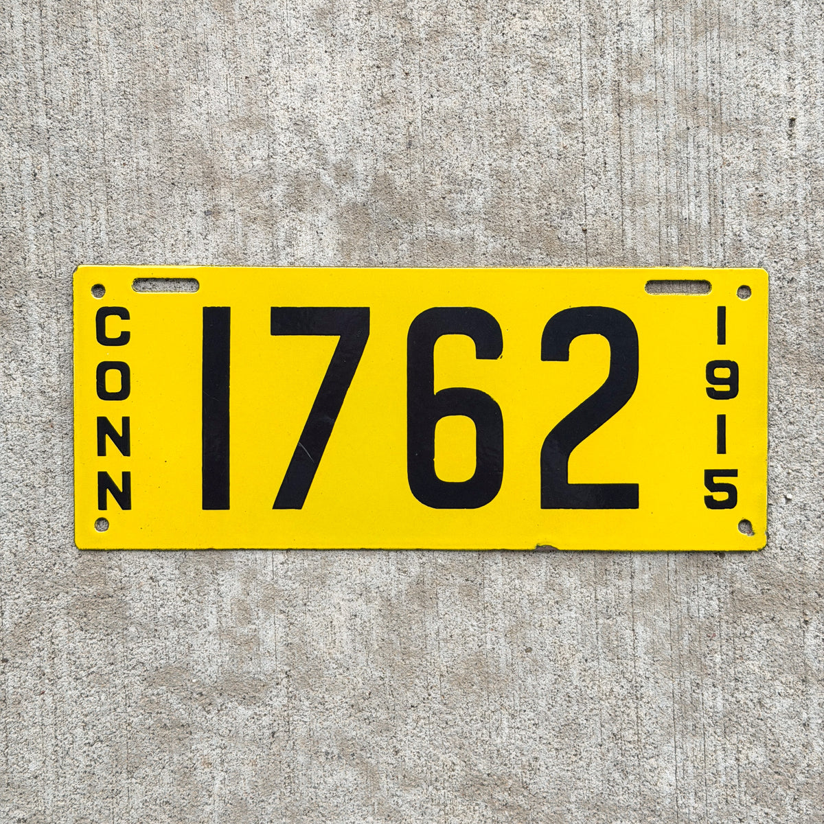 Photo of a 1915 Connecticut Porcelain Commercial License Plate Auto Tag Garage Decor Vintage High Quality Four Digit 1762 with original patina