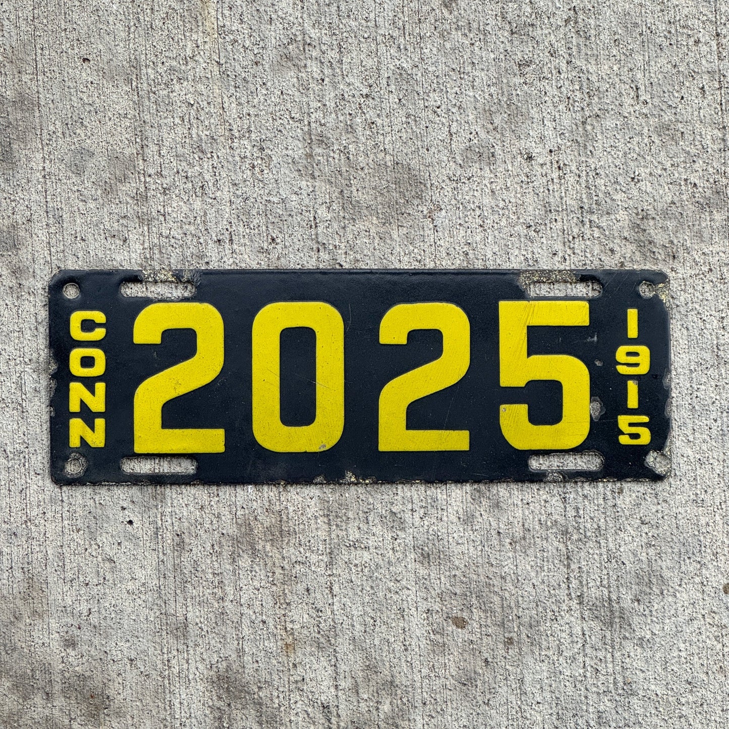 Photo of a 1915 Connecticut Porcelain Motorcycle License Plate Auto Tag Garage Decor Vintage 2025 with original patina