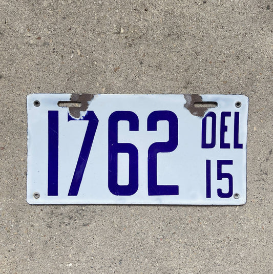 Photo of a 1915 Delaware Porcelain License Plate Auto Tag Garage Decor Vintage High Quality 1762 with original patina