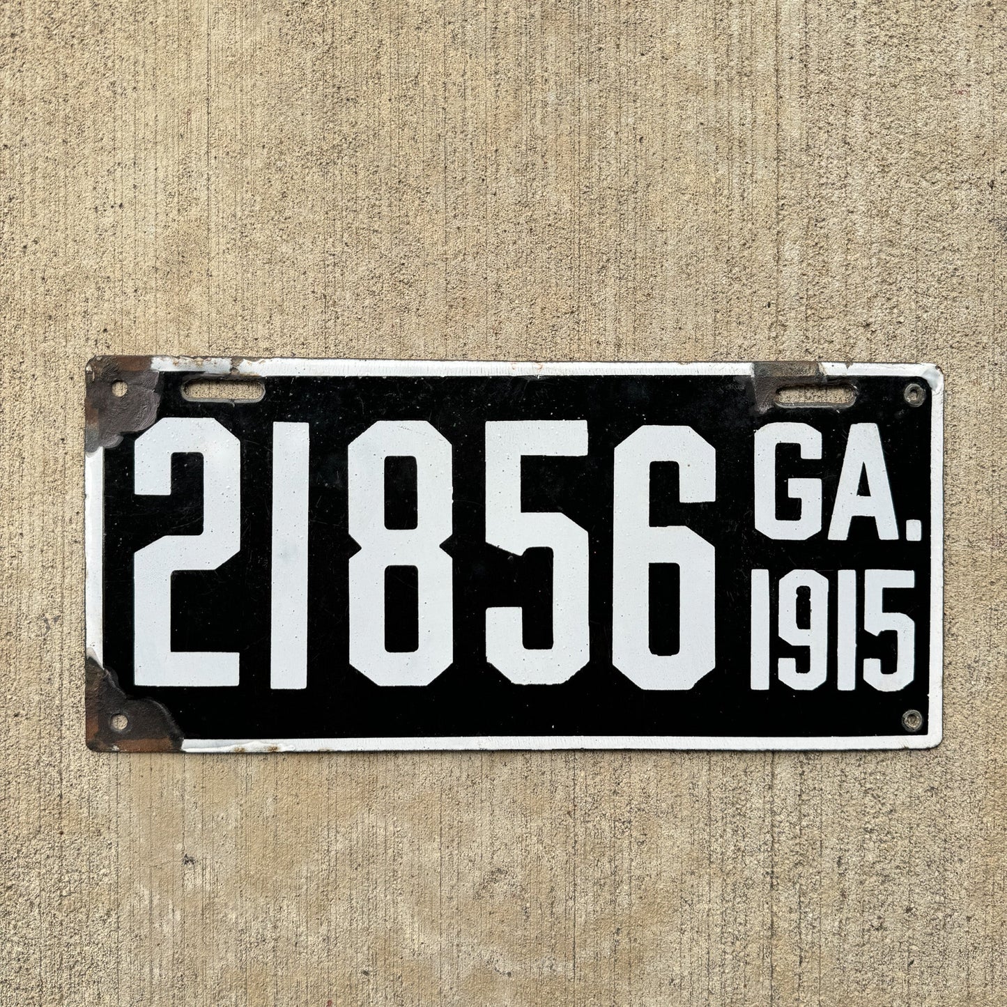 Photo of a 1915 Georgia Porcelain License Plate Auto Tag Garage Decor Vintage High Quality 21856 with original patina