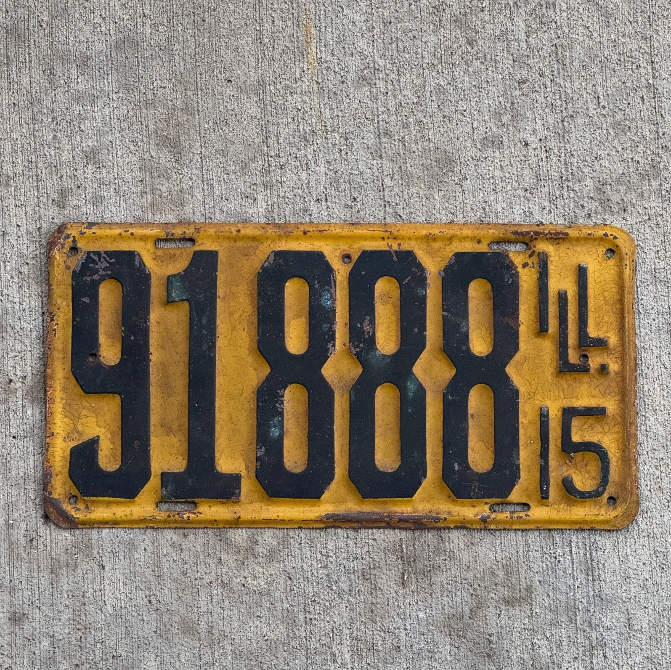 Photo of a 1915 Illinois License Plate Auto Tag Garage Decor Vintage 91888 with original patina