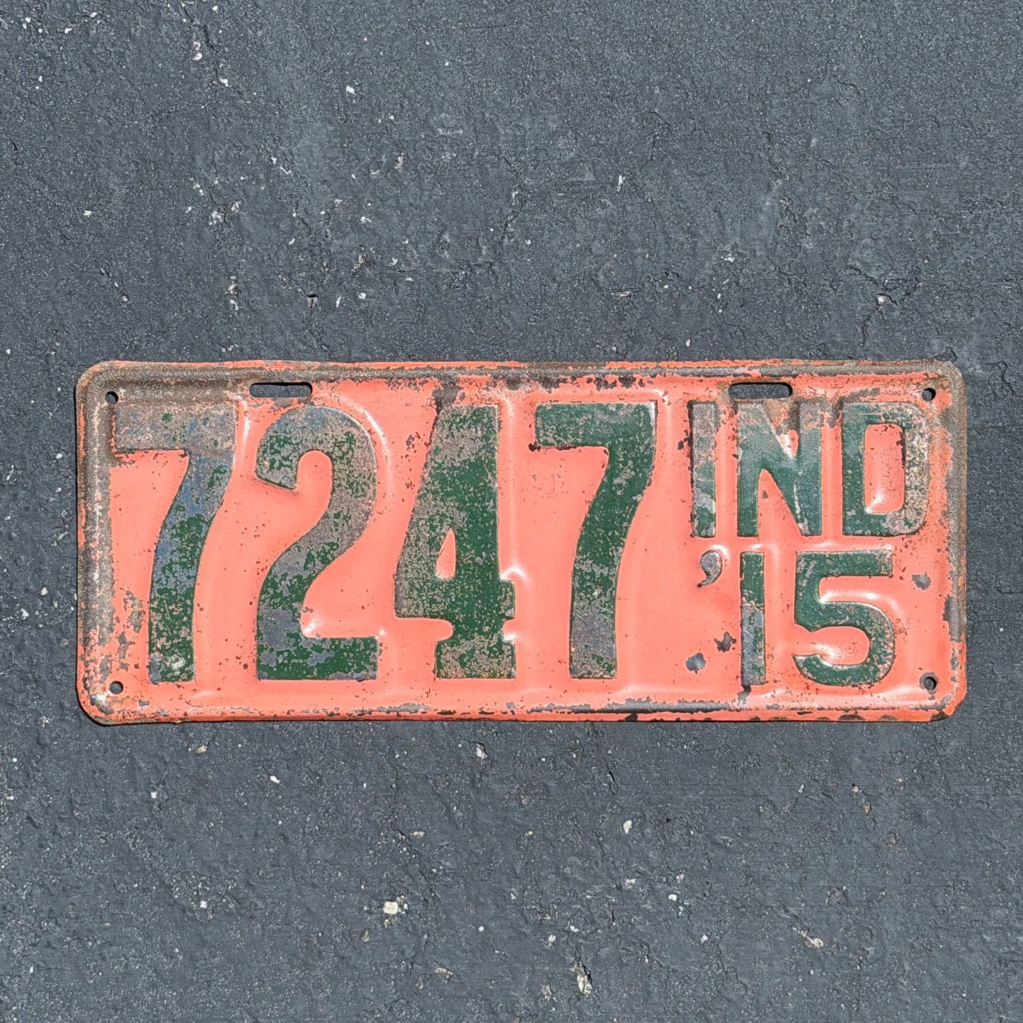 Photo of a 1915 Indiana License Plate Auto Tag Garage Decor Vintage Low Number Four Digit Nice Quality Paint 7247 with original patina