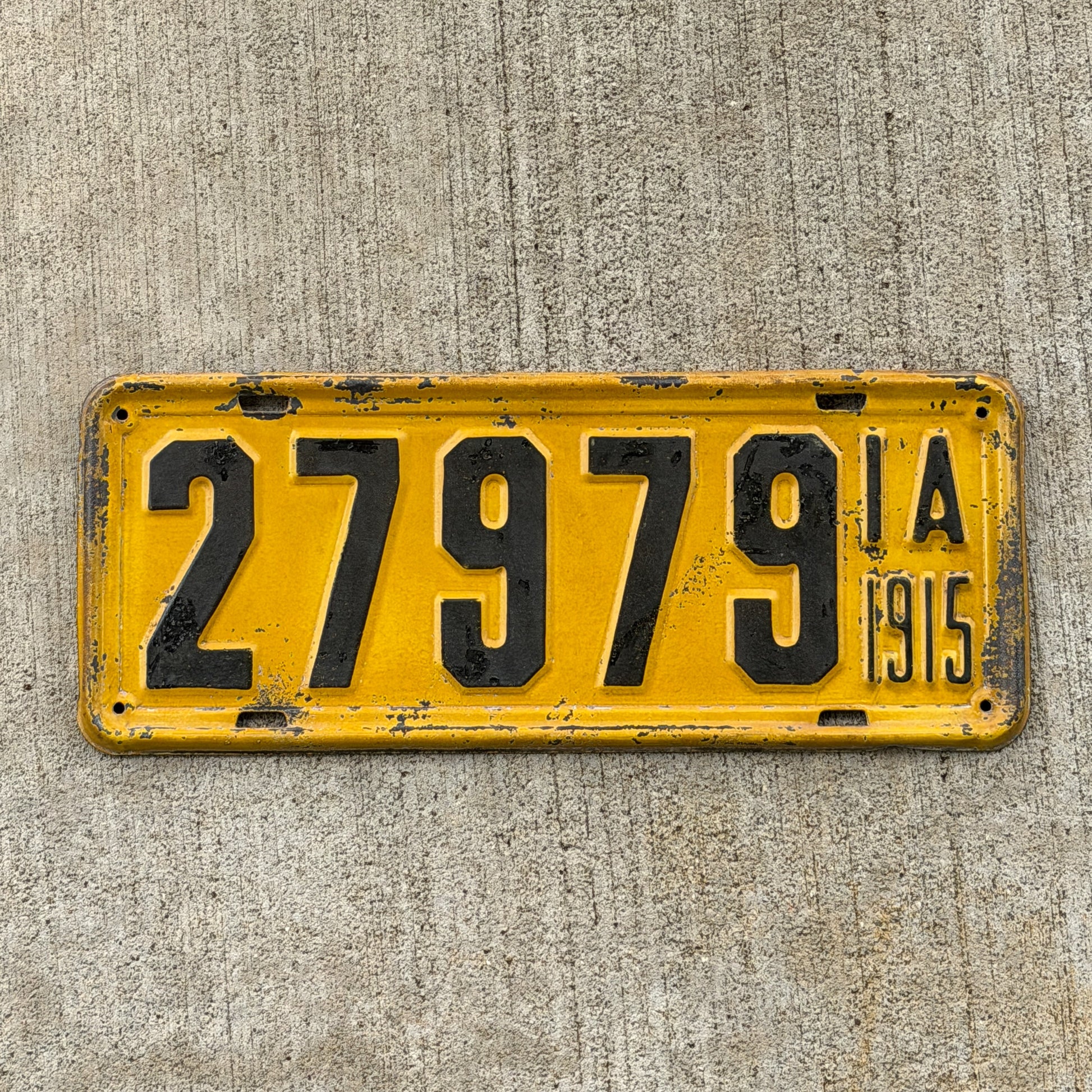 Photo of a 1915 Iowa License Plate Auto Tag Garage Decor Vintage 27979 with original patina