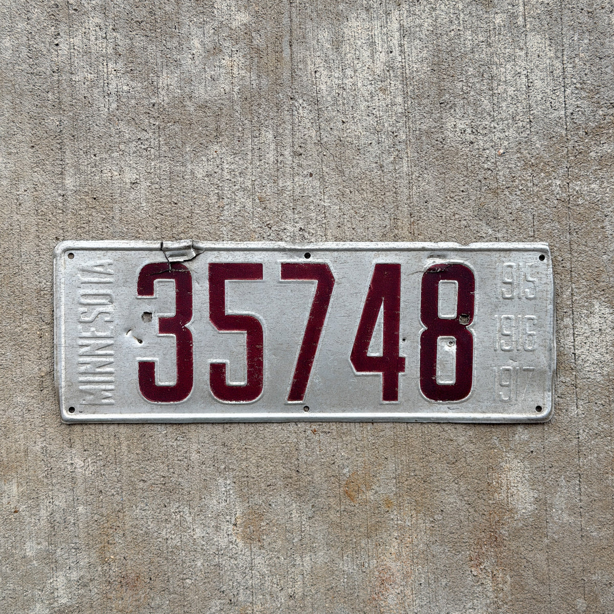 Photo of a 1915 Minnesota License Plate Auto Tag Garage Decor Vintage 35748 with original patina