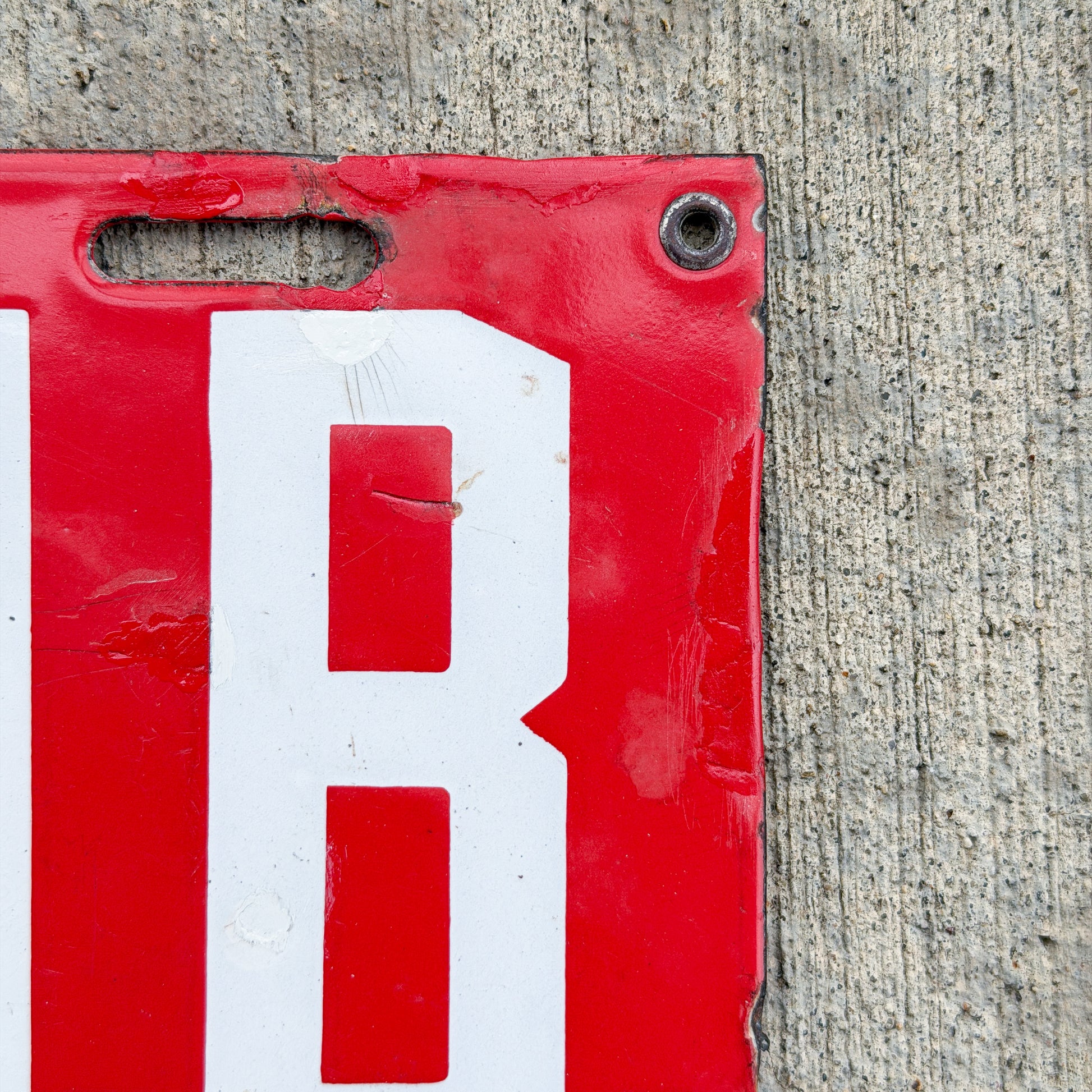 Photo of a 1915 New Brunswick Porcelain Dealer License Plate Auto Tag Garage Decor Vintage Low Number Two Digit 65 with original patina