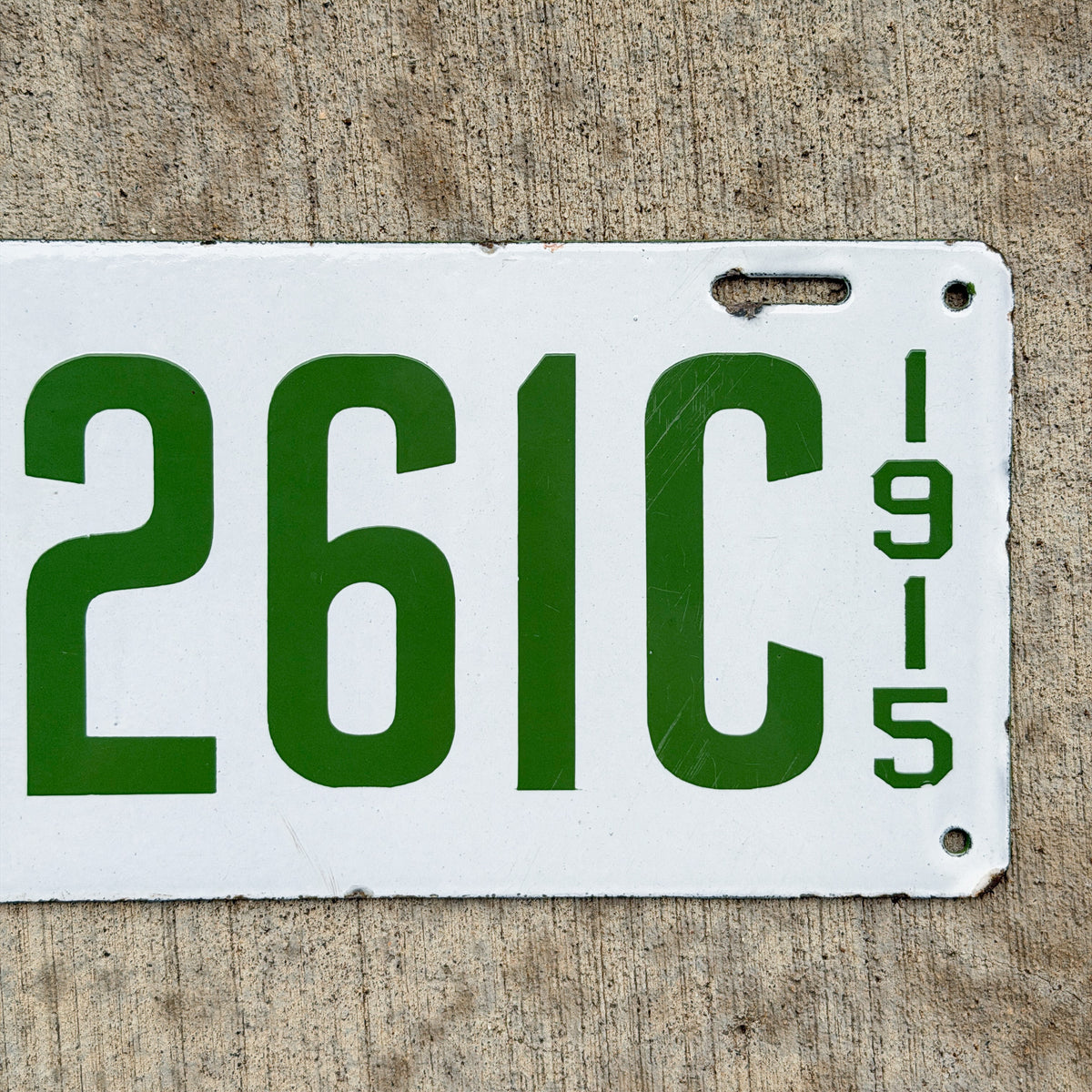 Photo of a 1915 New Hampshire Porcelain Dealer License Plate Auto Tag Garage Decor Vintage High Quality A 261 C with original patina