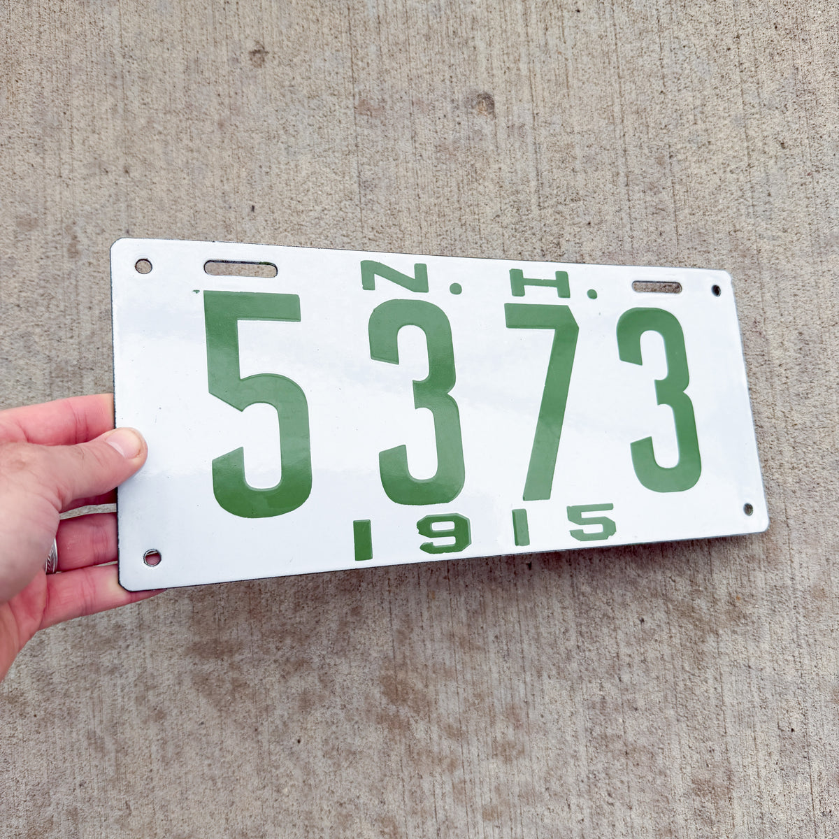 Photo of a 1915 New Hampshire Porcelain License Plate Auto Tag Garage Decor Vintage High Quality 5373 with original patina