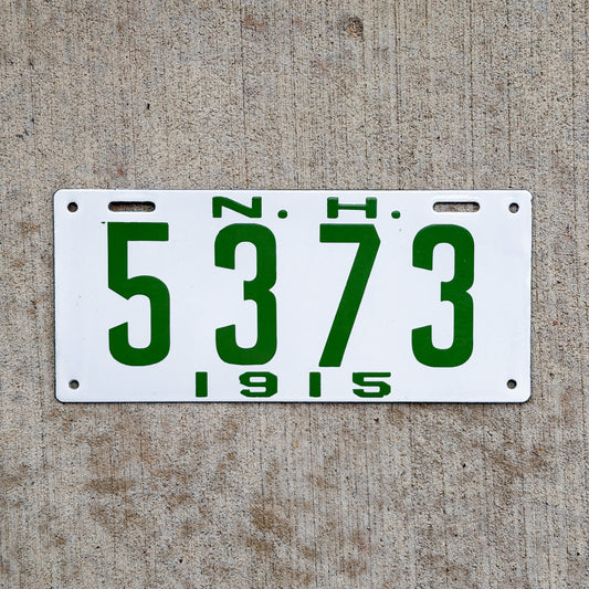 Photo of a 1915 New Hampshire Porcelain License Plate Auto Tag Garage Decor Vintage High Quality 5373 with original patina